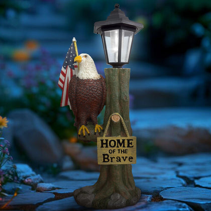 365RUSTIC eagle solar statue with flag lights your outdoor space at night