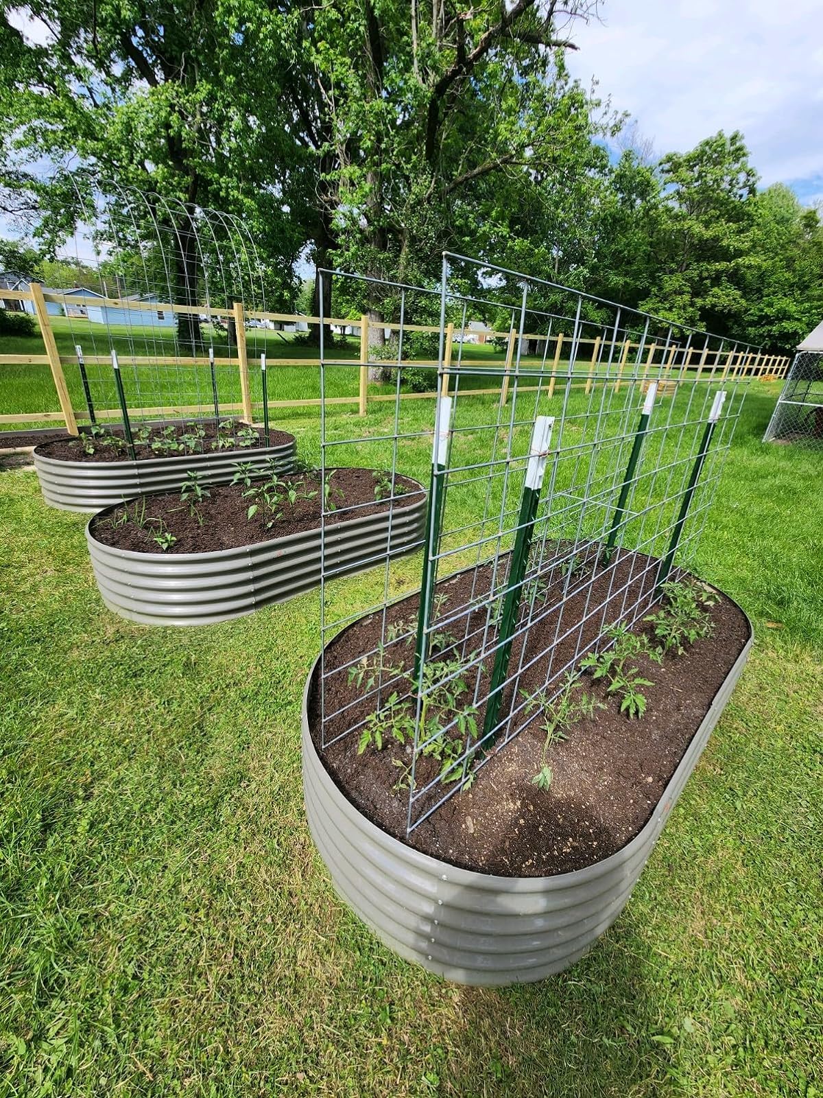 A ANLEOLIFE oval raised bed side view highlighting rust resistance for durable outdoor growing.