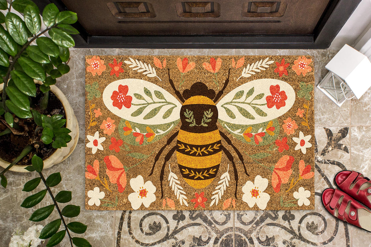 Abbott Collection Floral Bee Doormat bee closeup highlighting whimsical motif and durability.