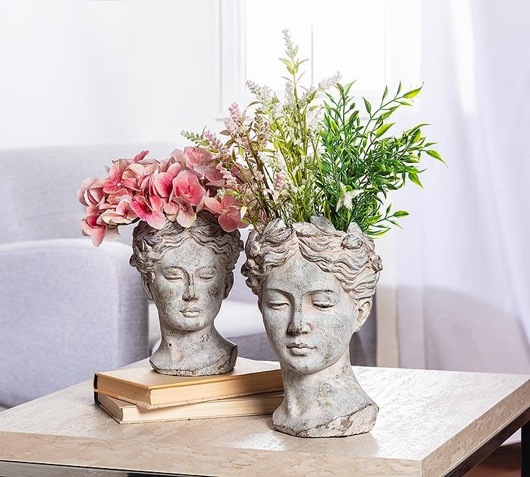 Goddess Head Planter in garden setting, Abbott Collection, large grey display.