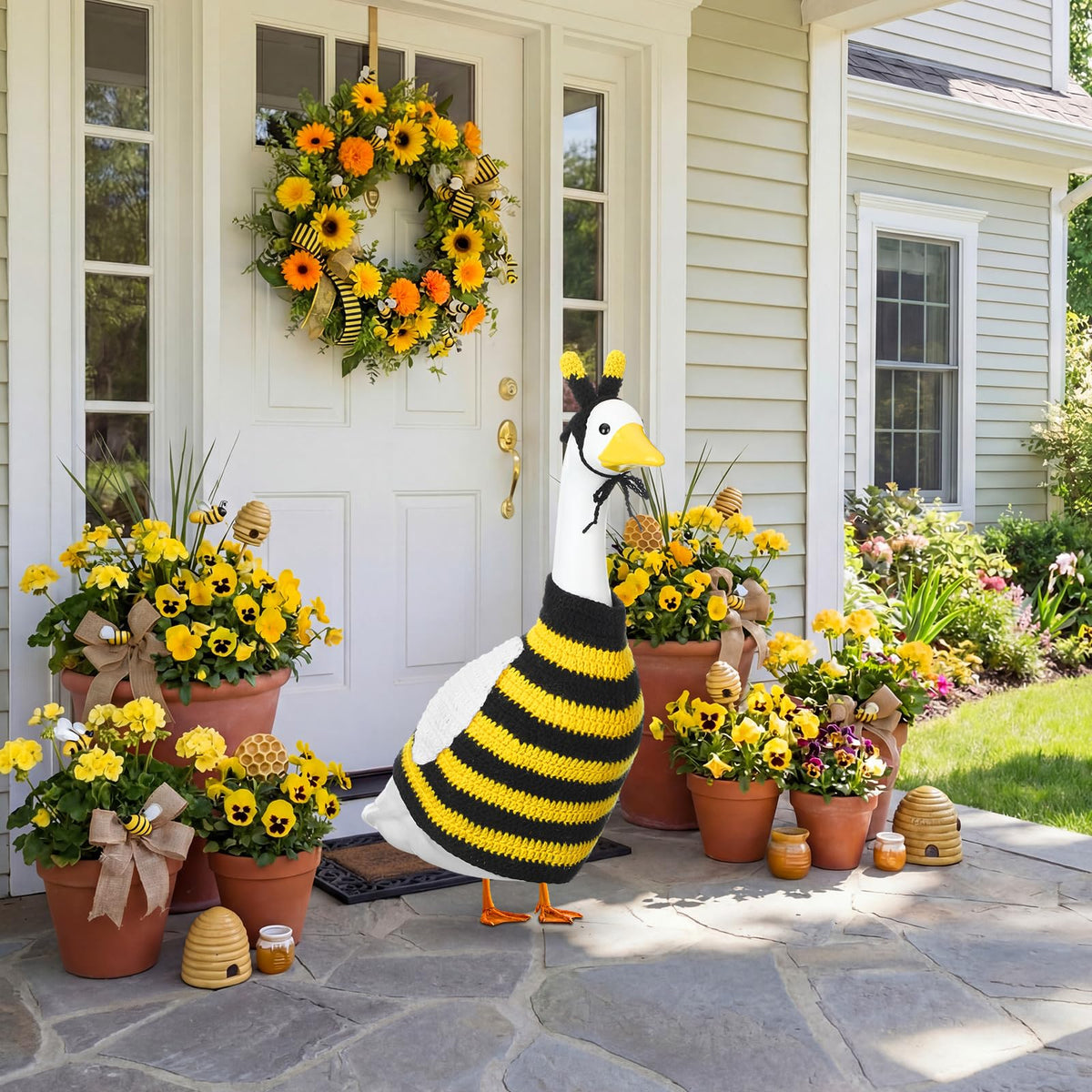 Abbylike outdoor goose costume enhances garden display.