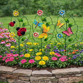 ABELOTS three piece garden stake set shown in a sunny yard