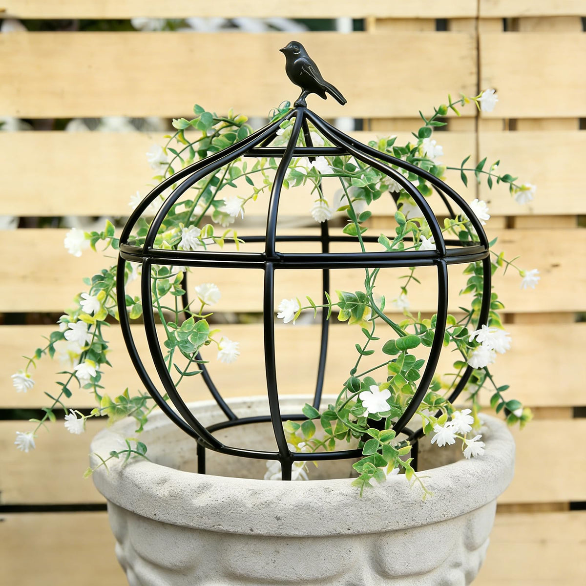 aboxoo obelisk trellis bird-top enhances vertical garden displays and plant support.