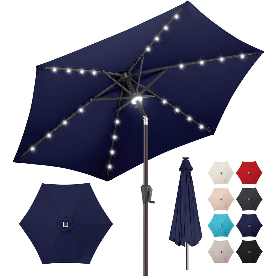 AckMizz 7.5ft solar umbrella lit at night, creating cozy patio lighting.