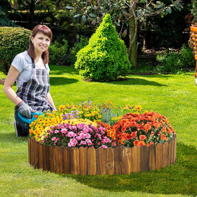 Acostop garden border creating clean lines along lawn and flower beds.