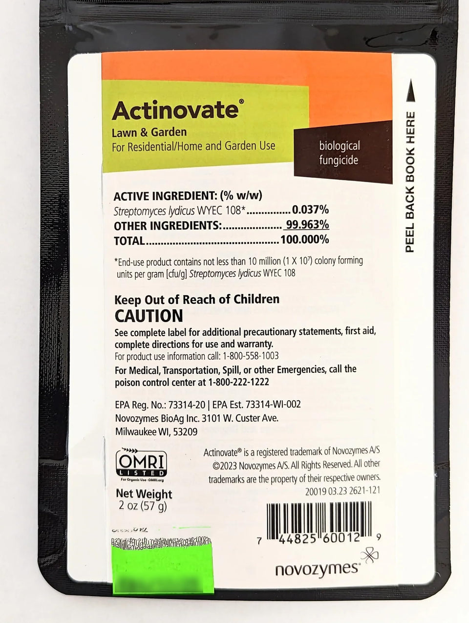 Actinovate lawn fungicide bottle shown for organic garden protection.