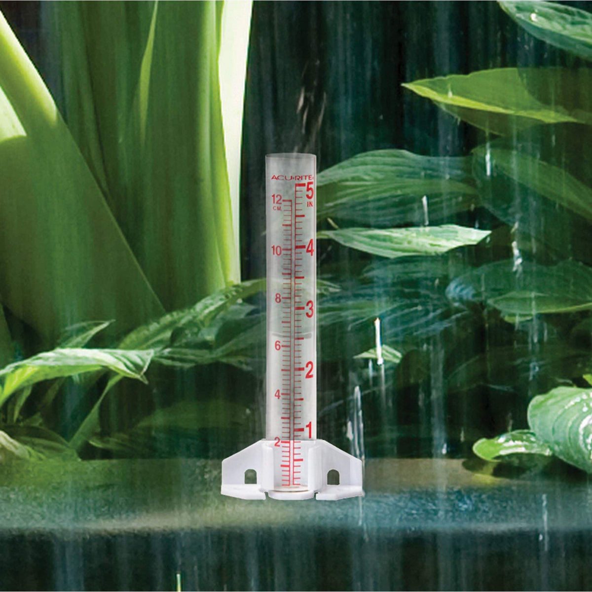 AcuRite 00810A2 glass rain gauge standing upright for garden monitoring.