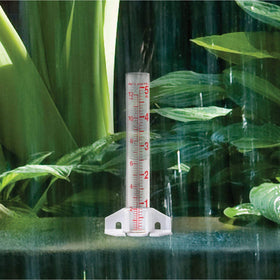 AcuRite 00810A2 glass rain gauge standing upright for garden monitoring.