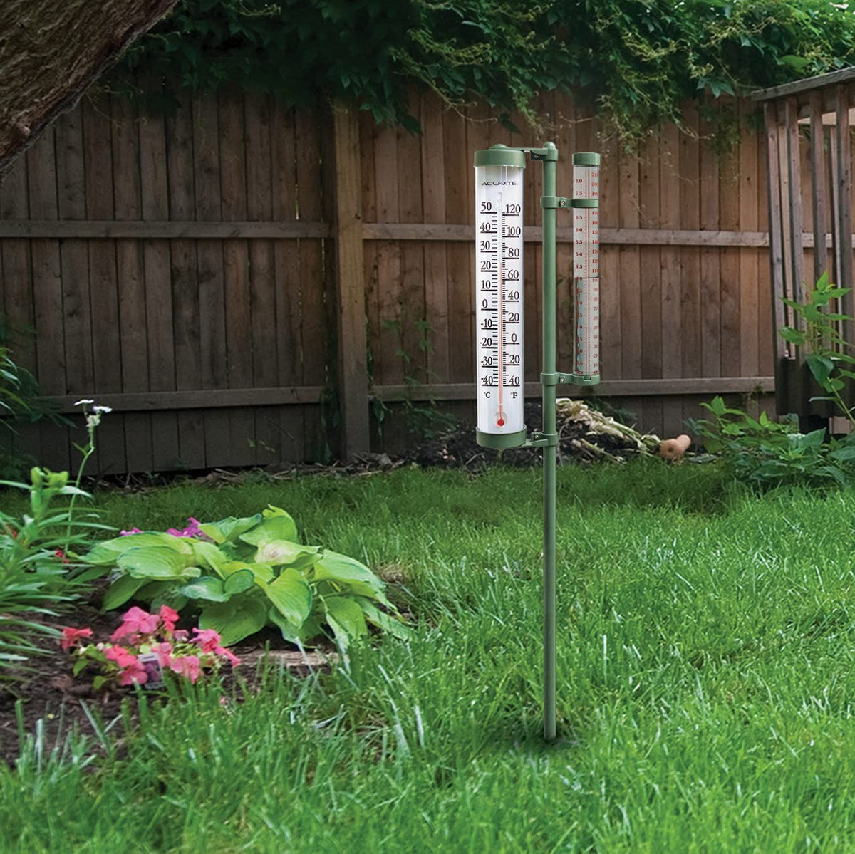 Acurite 02345 42-inch stand stabilizes the gauge in a garden setting.
