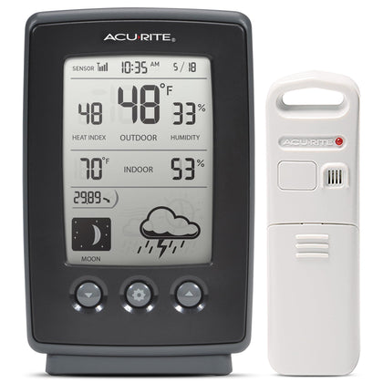 AcuRite digital weather forecaster display shows indoor and outdoor temperatures and humidity.