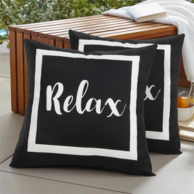 Adabana outdoor pillow cover in black and white with waterproof fabric for patio surfaces.