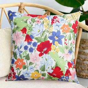 Adabana patio setting with colorful cushions enhancing garden ambiance