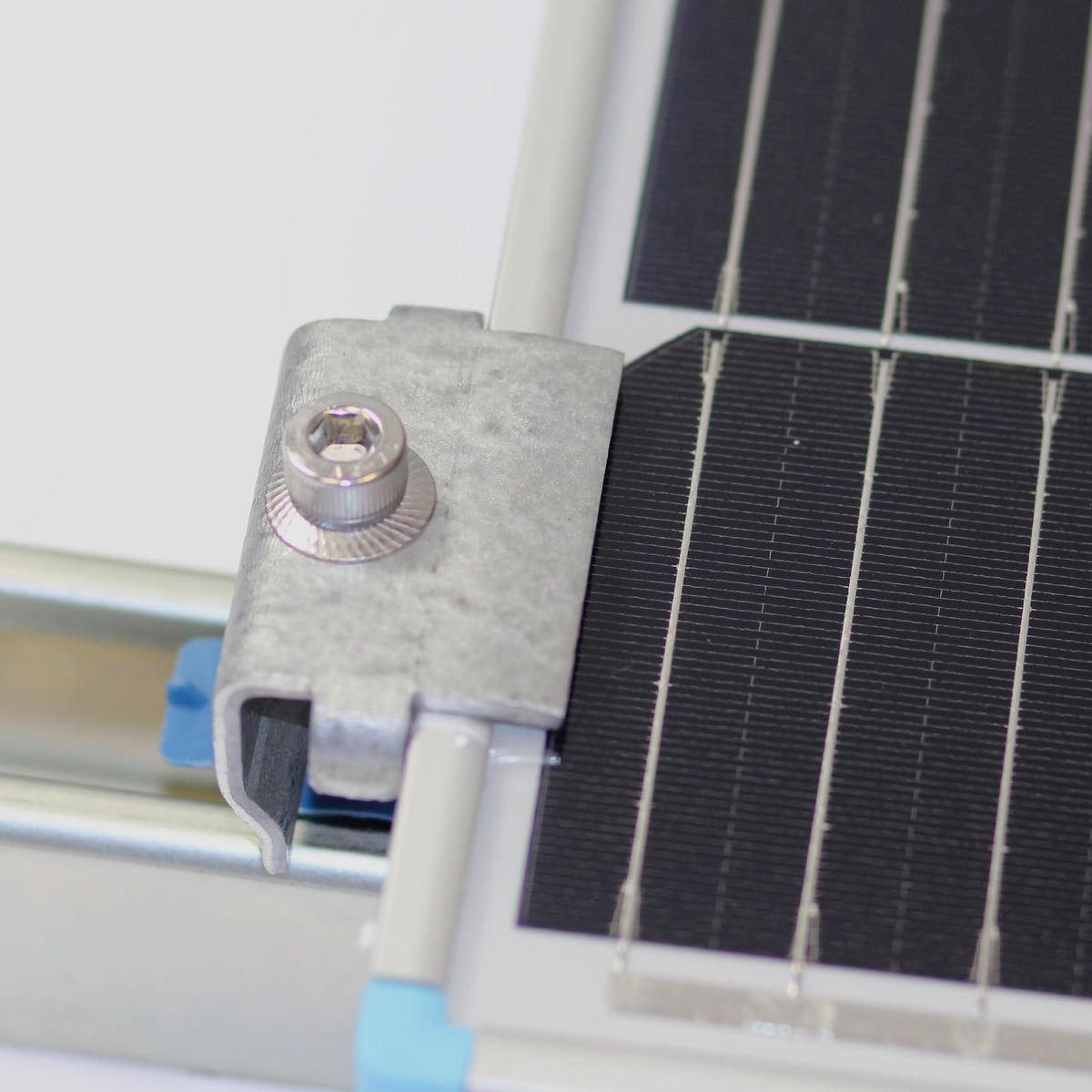 Adamax SPEC158 weatherproof clamps on rooftop installation showing corrosion-resistant finish.