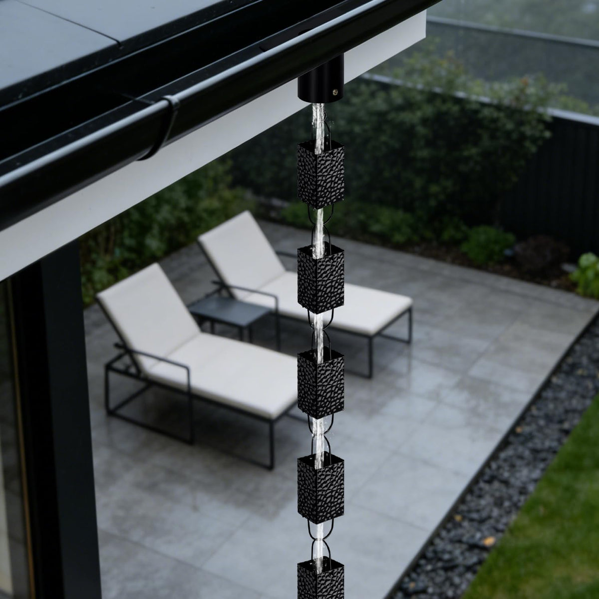 Adorafur rain chains styled as a garden feature during rainfall