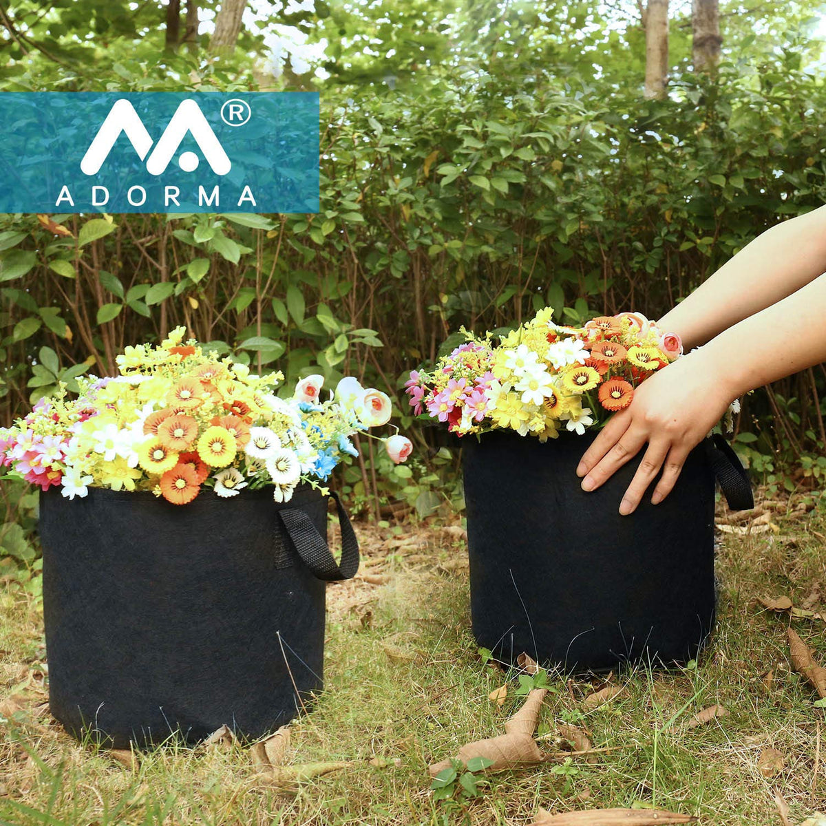 ADORMA 12-pack 15 gallon grow bag in garden ready for versatile planting.