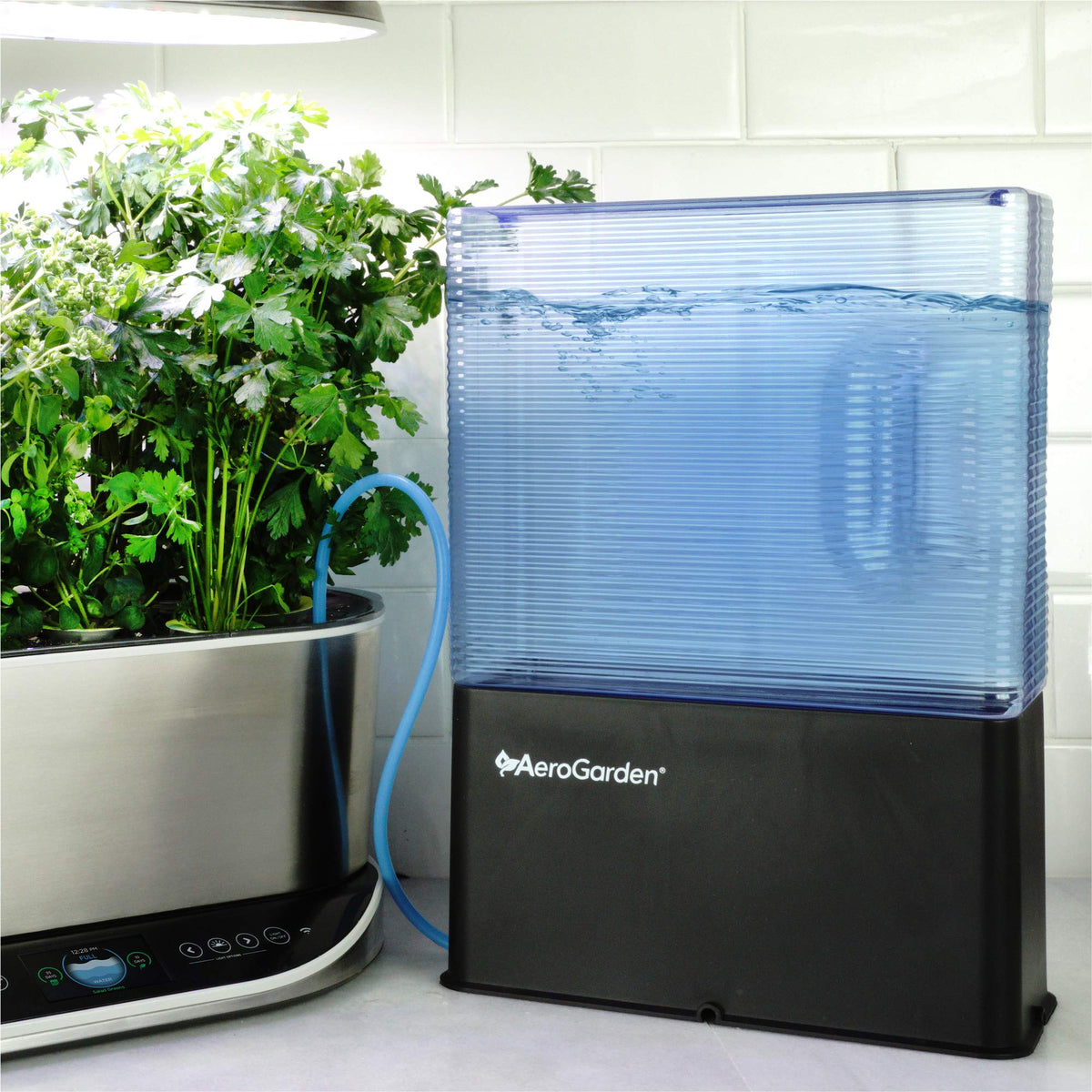 AeroVoir reservoir exterior close-up with slim design fitting beside a countertop garden