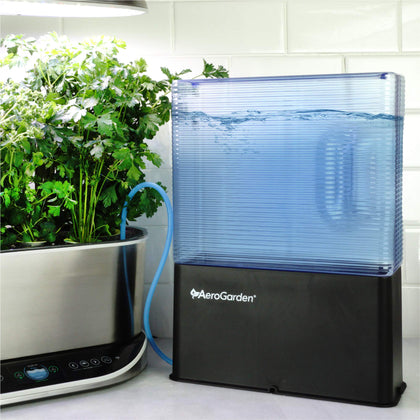 AeroVoir reservoir exterior close-up with slim design fitting beside a countertop garden