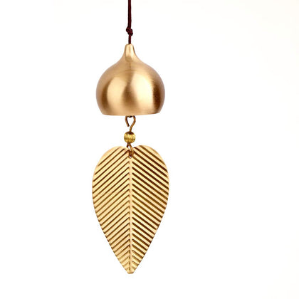 Afiaiwei gold leaf hanging bell on door enhances welcoming energy and décor.
