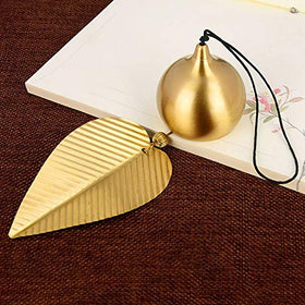 Afiaiwei gold leaf bell on a window adds feng shui charm.