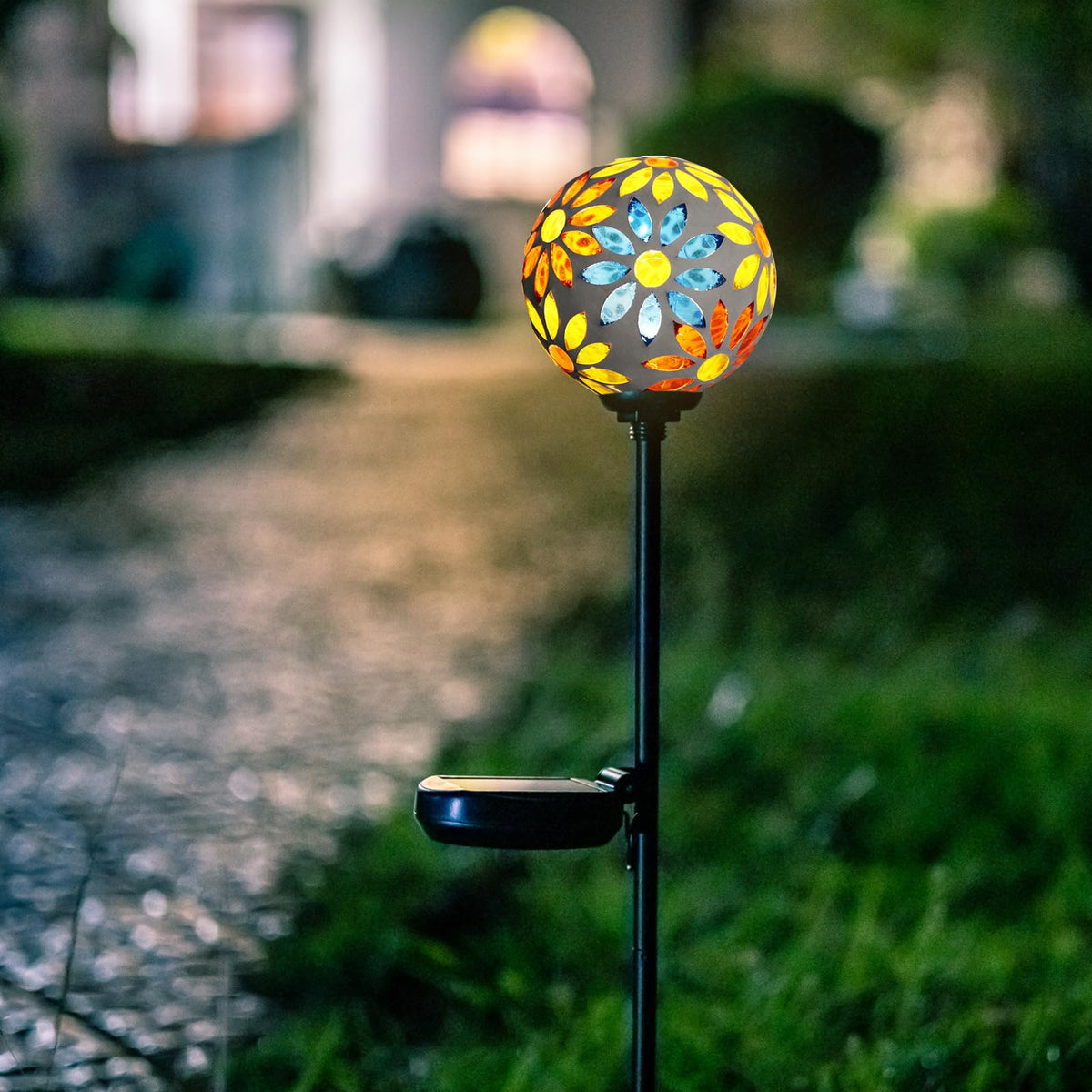 Afirst crackle-glass reflections create ambient garden illumination