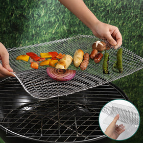 Aglehome outdoor grilling session with topper simplifies cleanup afterward.