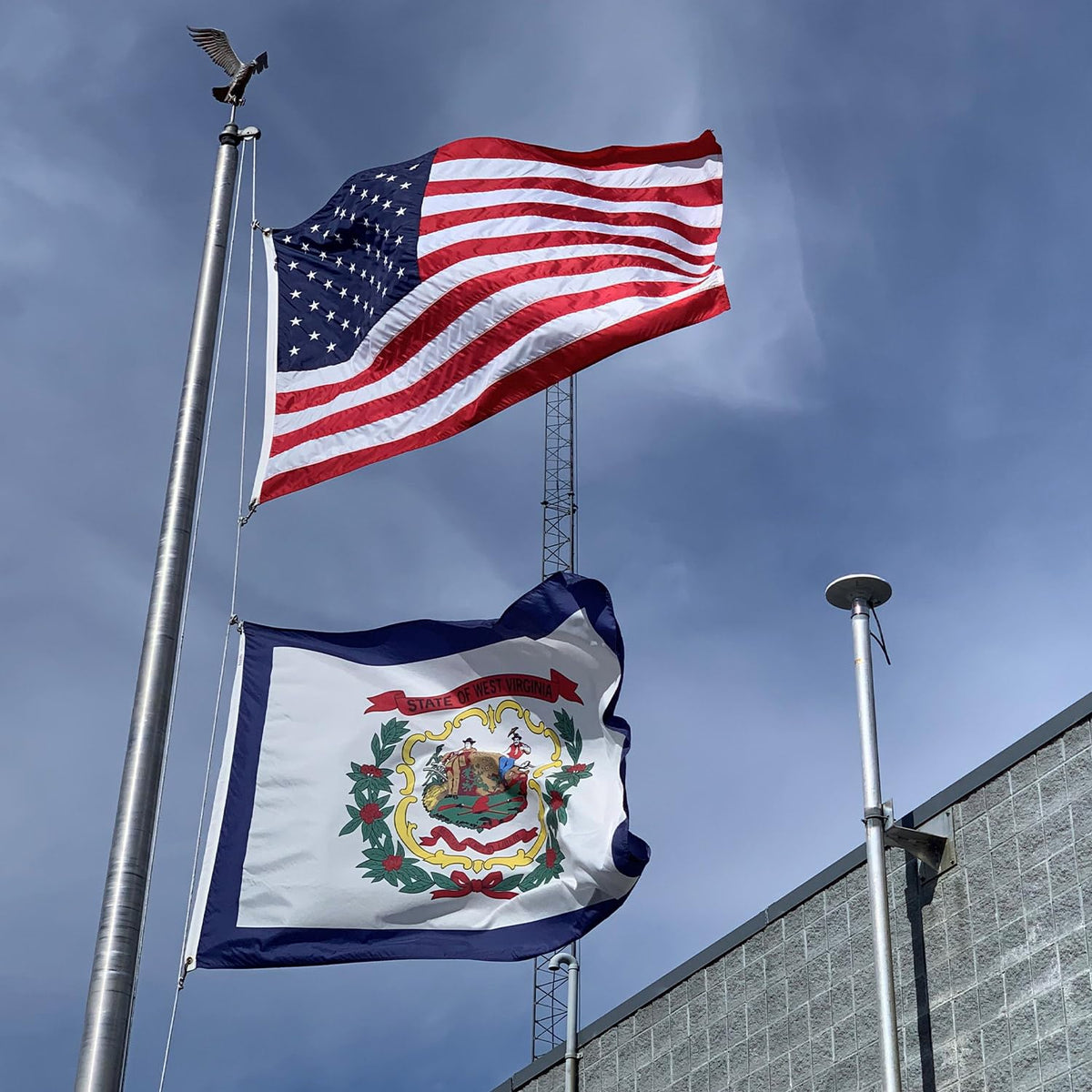 AGUIFLGS WV flag fluttering on a windy day suitable for outdoor display