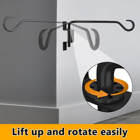 Aidoclip wall-mounted hanger displaying baskets and wind chimes for outdoor decor.