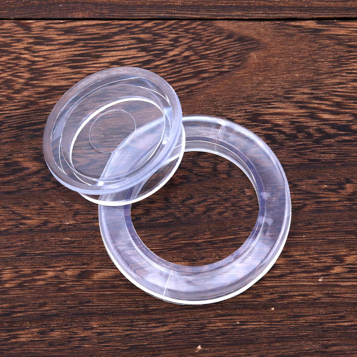 AIEX packaging shows two rings and two caps included
