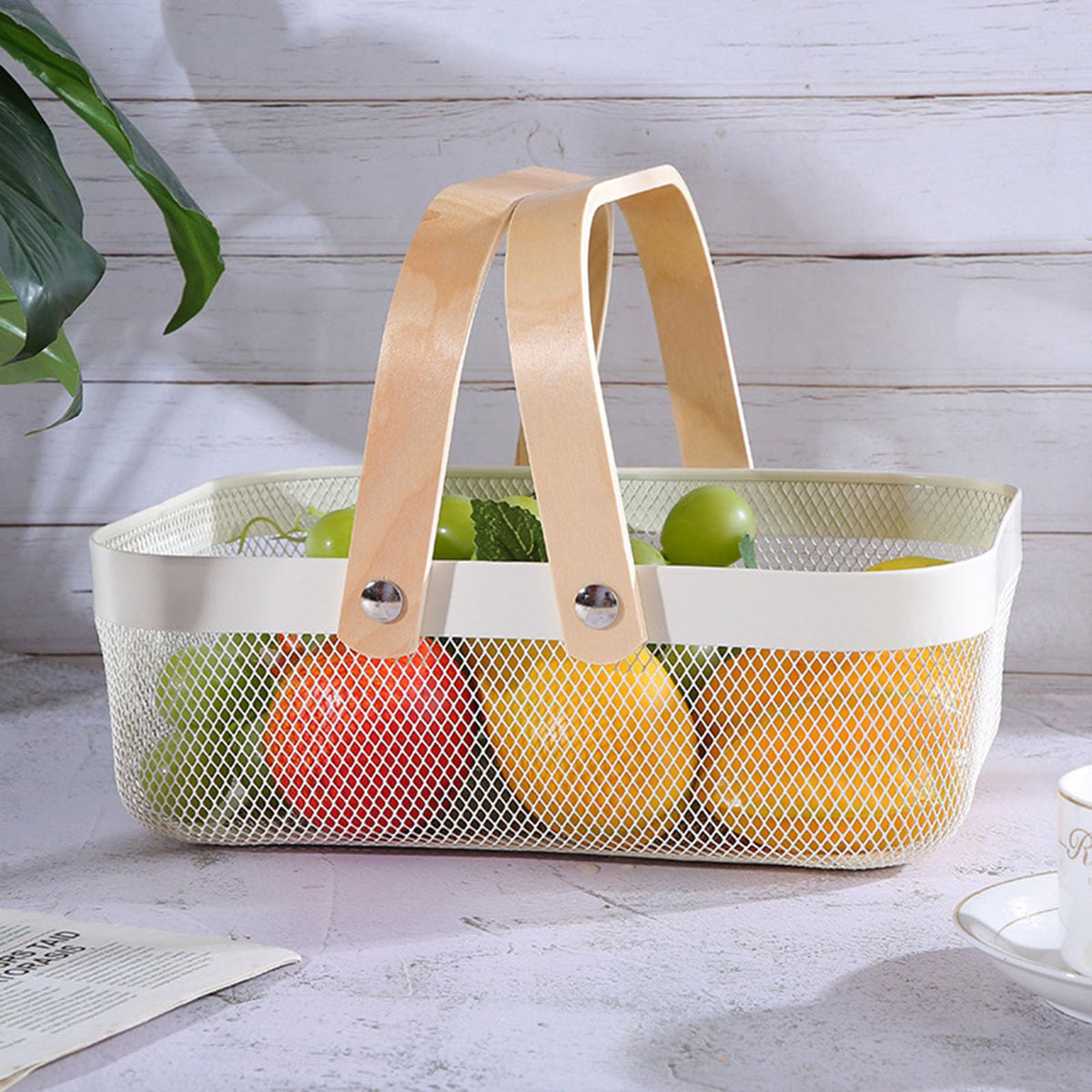 AJIODA fruit basket with wooden handle ideal for countertop produce.