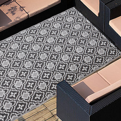 Alfolo outdoor rug waterproof 4x6 for patios keeps surfaces dry and stylish.