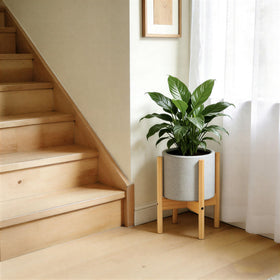 ALIGADO stand features non-slip feet protecting floors on uneven surfaces