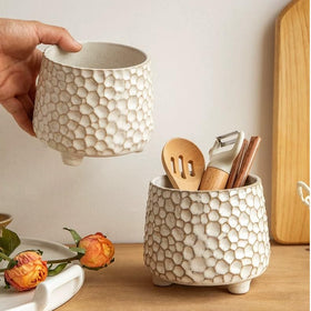 Alikexin rustic planter enhances countertops as a stylish storage solution.