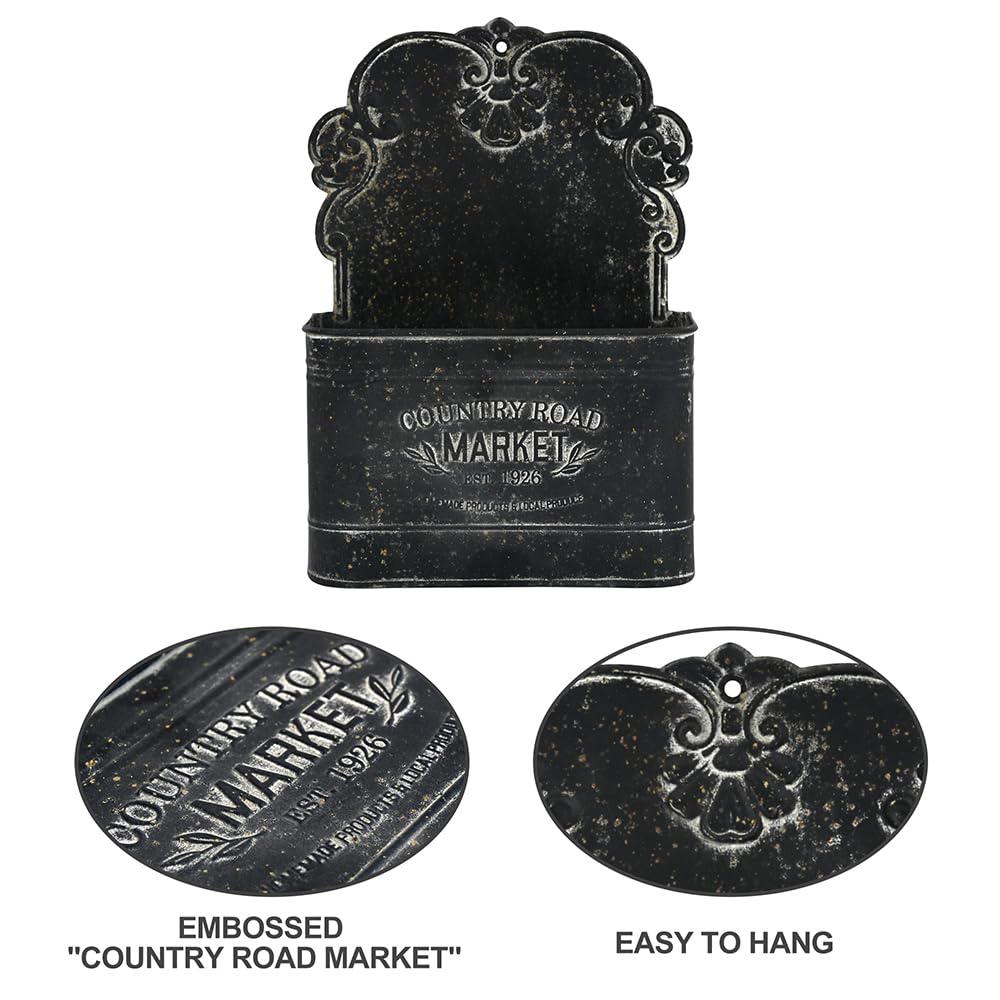 All Chic black metal wall planter close-up shows distressed finish and sturdy build
