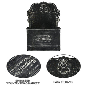 All Chic black metal wall planter close-up shows distressed finish and sturdy build