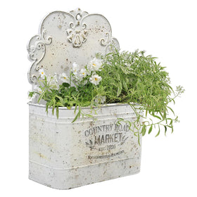 All Chic metal wall planter outer view in rustic blue for outdoor decor
