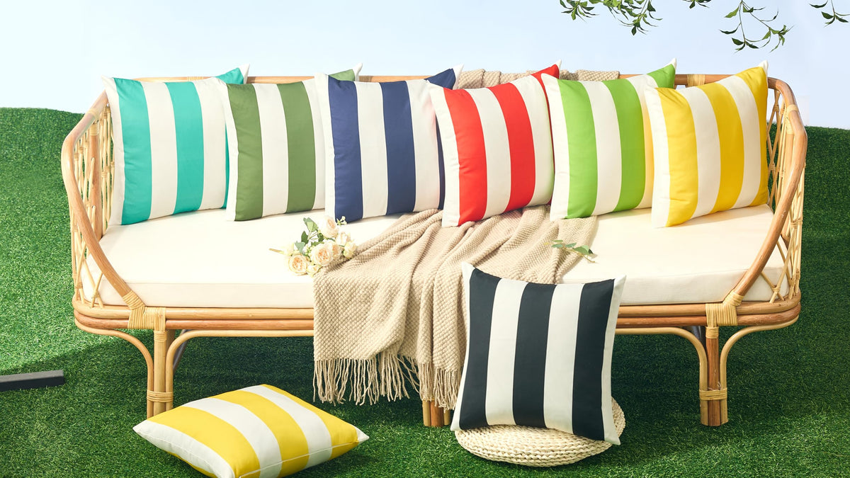 Allorry navy-striped pillow cover enhances patio decor on sofas and chairs.