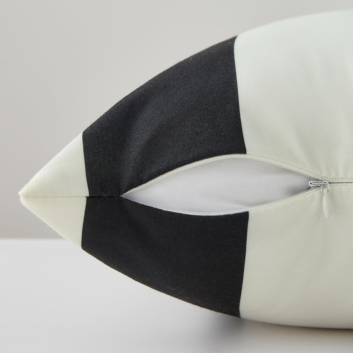 Allorry waterproof pillow cover keeps patio cushions dry during showers.
