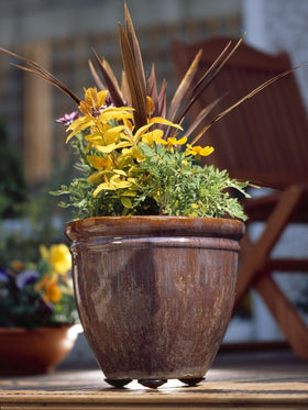 Allsop pot pads with lifter design elevating a planter