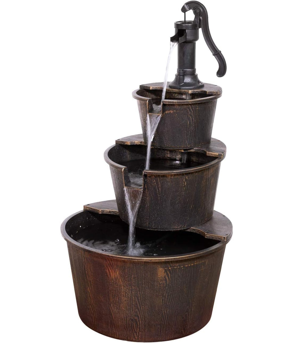 Alpine Corporation pump and barrel fountain outdoors with soothing water flow for patio