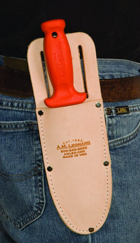 A.M. Leonard leather sheath shows durable stitching and rivets for lasting construction.