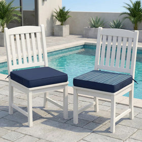 Amagenix outdoor chair cushions in navy stripe provide waterproof, fade-resistant comfort.