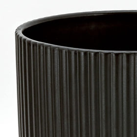 Amazon Basics fluted ceramic planter 10-inch for larger indoor plants.