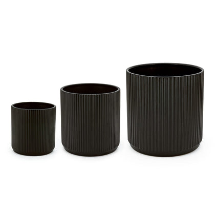 Amazon Basics fluted ceramic planter 6-inch with drainage hole for herbs.