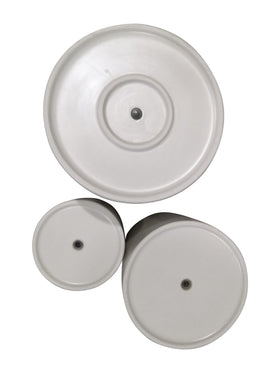 Amazon Basics planter showing drainage hole and rubber plug for plant care