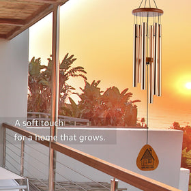 AMBOBE housewarming wind chime hanging in garden for calming outdoor ambiance.