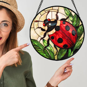 AMDERVEN sun catcher’s intricate patterns create a window focal point.