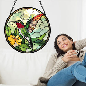 AMDERVEN close-up of the green hummingbird sun catcher reveals intricate glass details for decorative appeal.