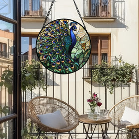 AMDERVEN Turquoise Peacock sun catcher creates vivid blue-green glow, ideal for cozy rooms.