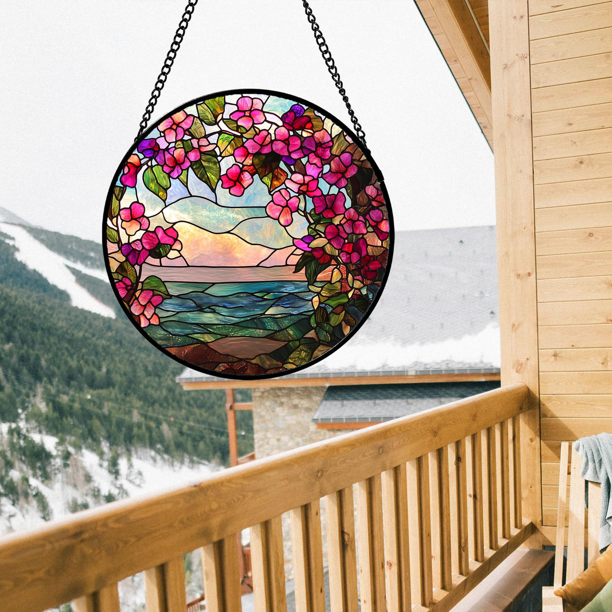 AMDERVEN sun catcher with purple flowers scatters warm colors across a window.