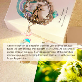 AMETHUARTZ hanging sun catcher displayed by window for ambient remembrance.